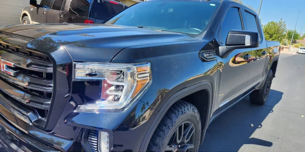 A black GMC truck after detailing by First Place Finish